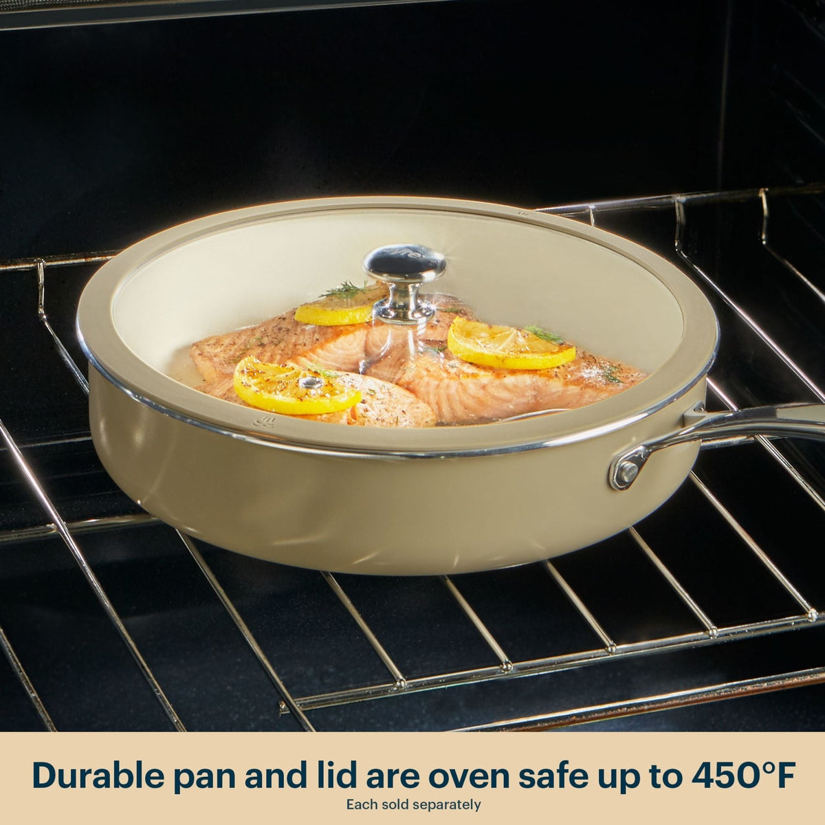 Beige ceramic cookware set with salmon dish inside an oven