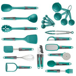 Collection of teal kitchen utensils and measuring tools on a white background
