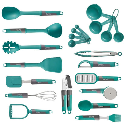 Collection of teal kitchen utensils and measuring tools on a white background