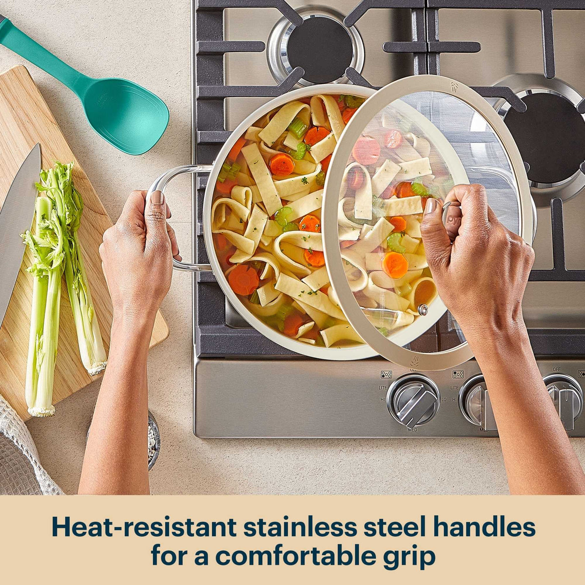 Person cooking pasta with vegetables on a stove, using heat-resistant stainless steel handles.