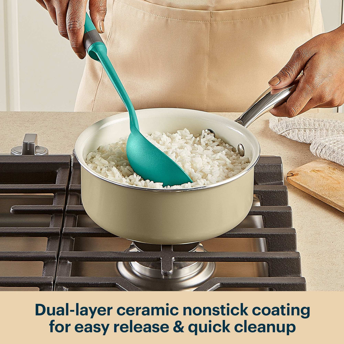 Person cooking rice in a pot with a green spoon on a stove, featuring dual-layer ceramic nonstick coating.