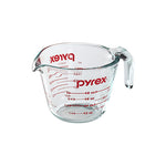 Pyrex measuring cup on a white background